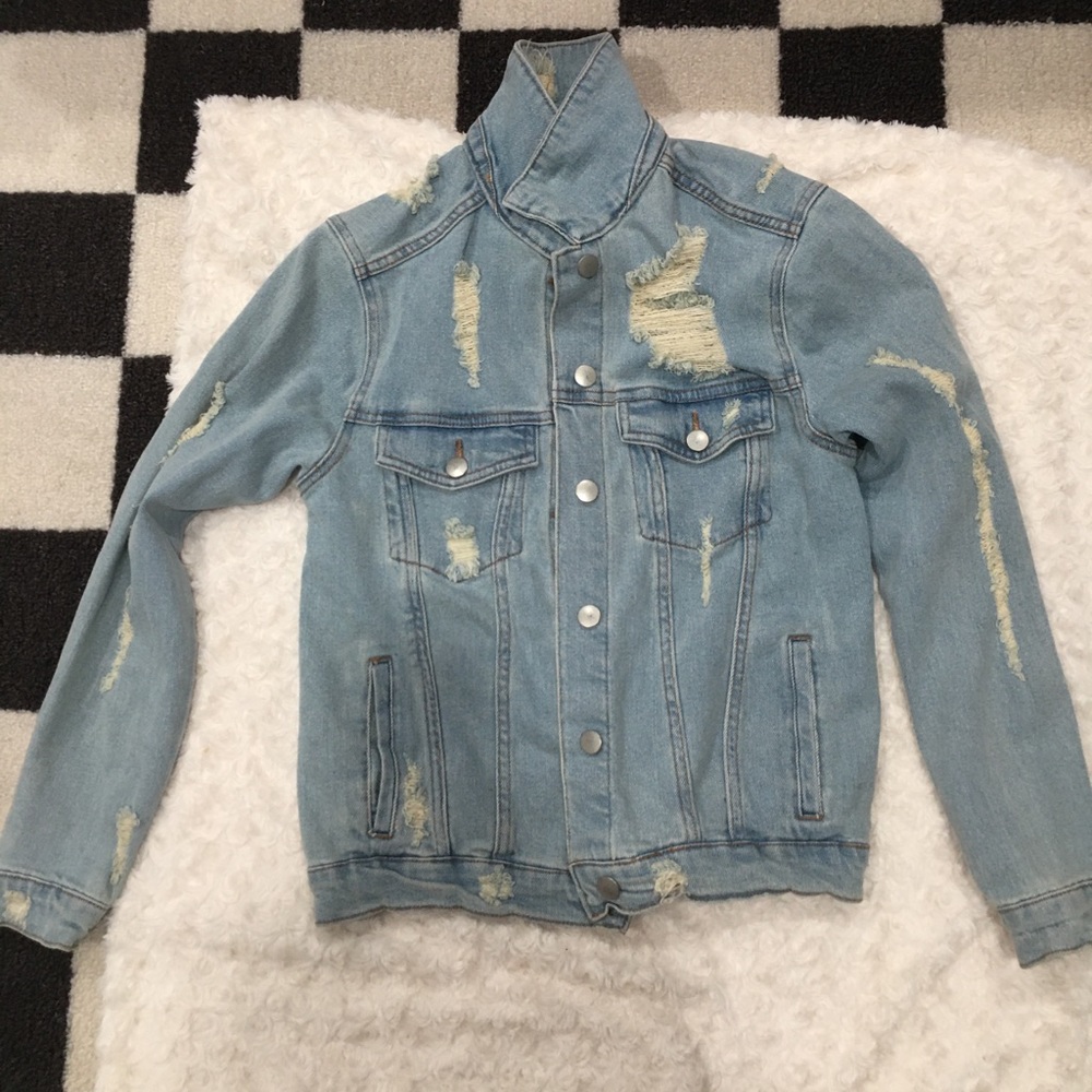Classic oversized light blue jean ripped jacket